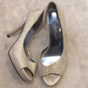 Michelangelo White heels.